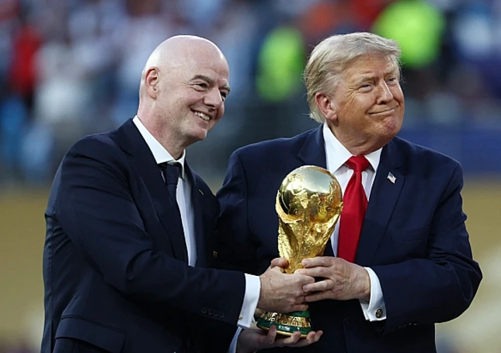 Джанні Інфантіно та Дональд Трамп на чемпіонаті світу з футболу